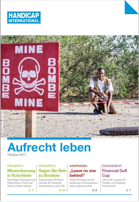 Das Titelbild der Spenderzeitschrift zeigt ein Gefahrenschild für Landminen und einen Mann hinter einem Absperrband.