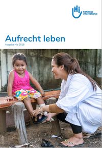 Das Titelbild der Spenderzeitschrift zeigt eine HI Ärztin und ein kleines Mädchen.